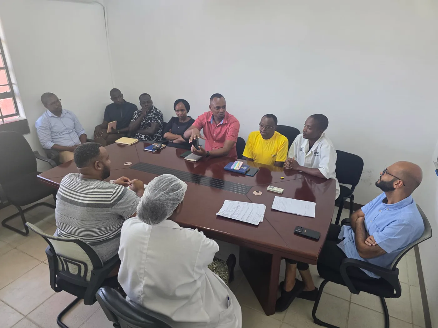 Plant management team in a review meeting with Andontech consultants